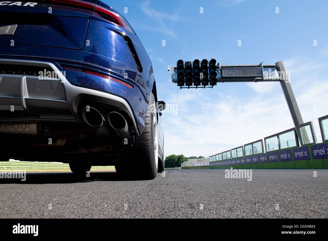 Vallelunga June 13 2021, Fx series racing. Lamborghini safety car on circuit asphalt track starting line, surface level view Stock Photo