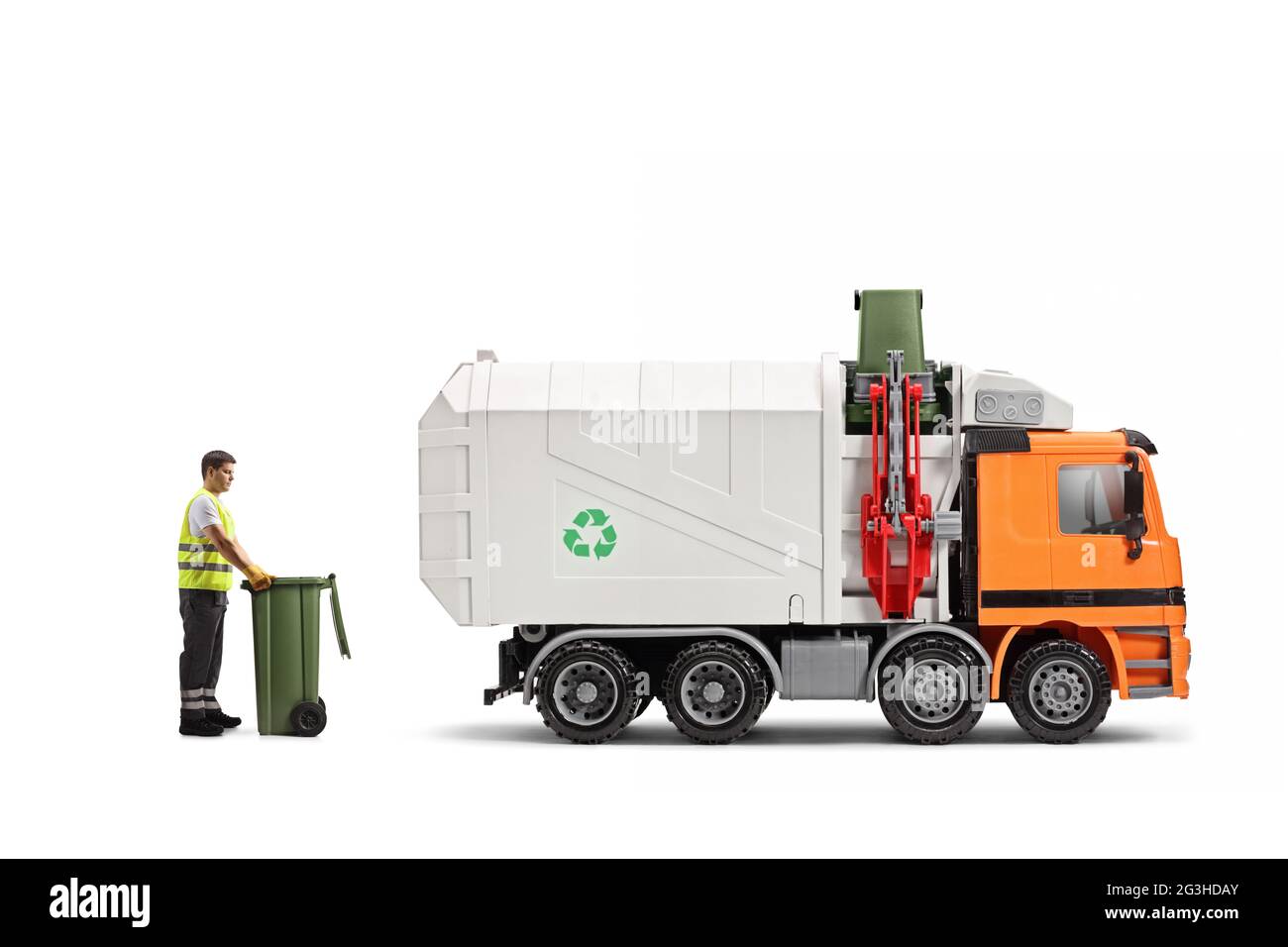 Full length profile shot of a waste collector with a bin standing