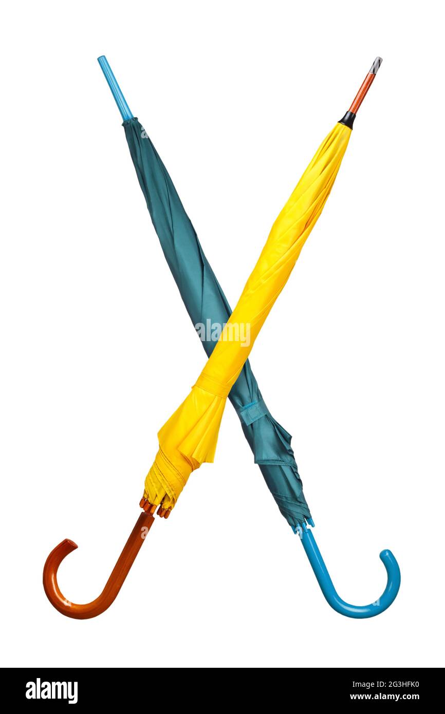 Crossed umbrellas on white Stock Photo