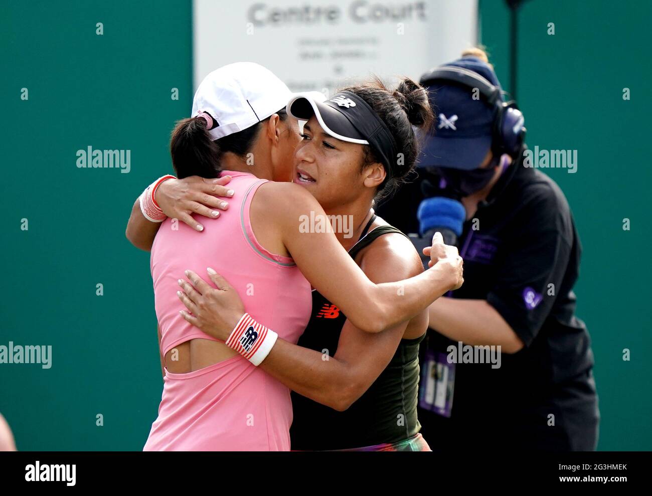 Great Britain's Heather Watson (right) hugs China's Zhang Shuai after
