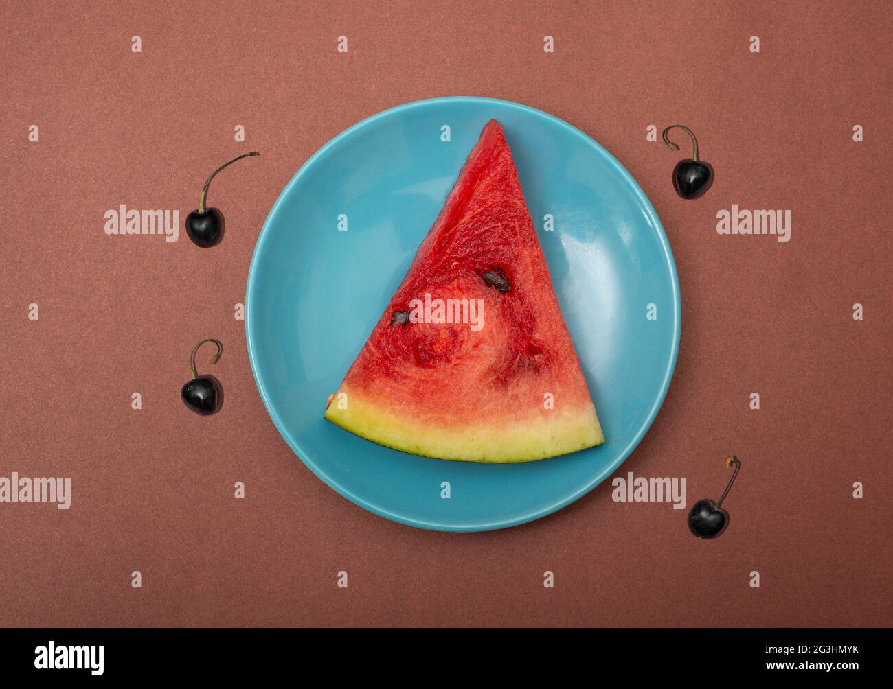 Watermelon peice in blue plate summer time concept. Stock Photo