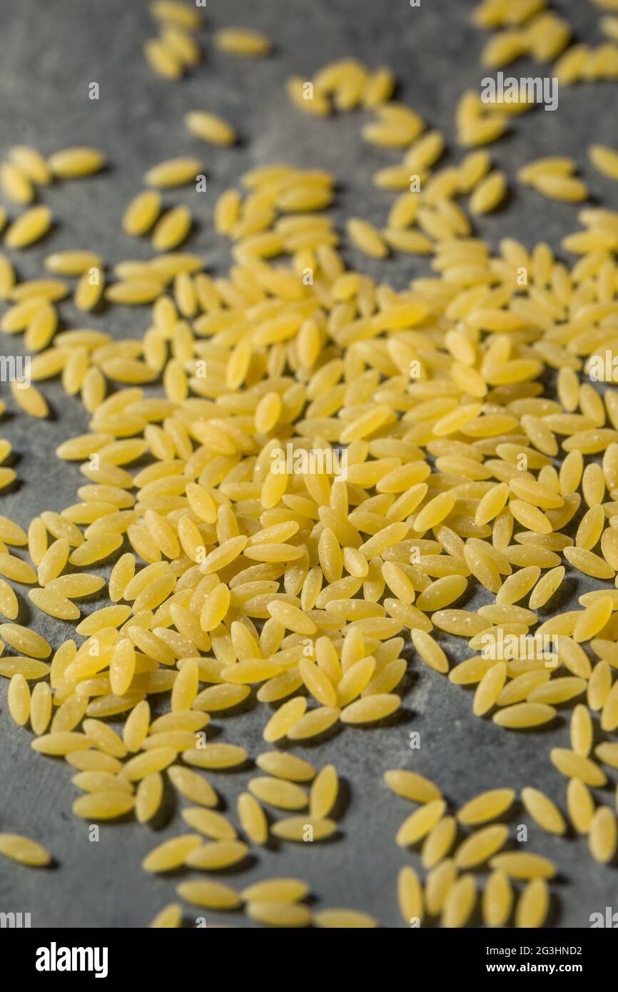 Raw Organic Dry Orzo Pasta in a Bowl Stock Photo Alamy