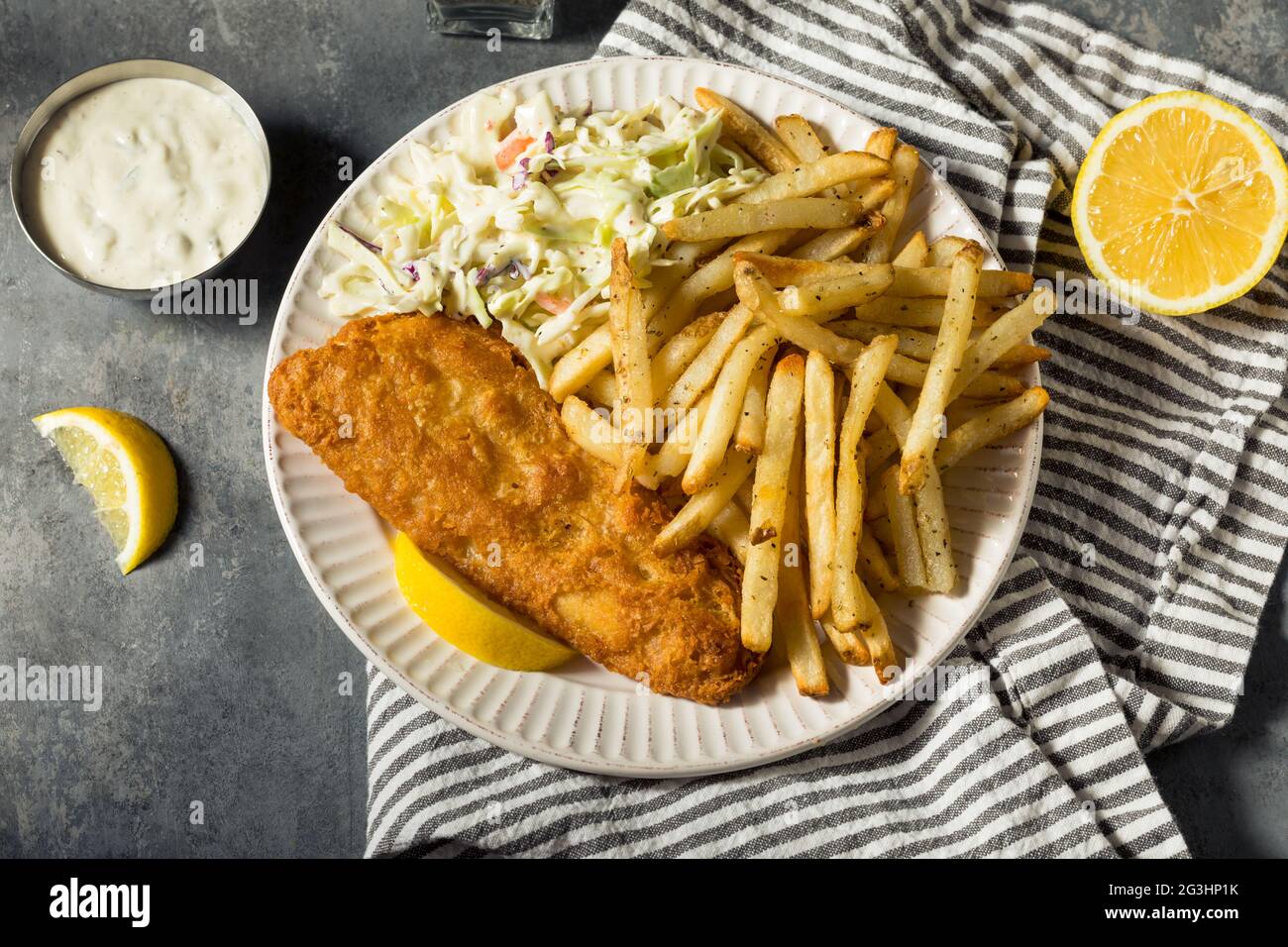 Homemade Fried Fish Dinner with Coleslaw and French Fries Stock Photo -  Alamy, image size:1300x956
