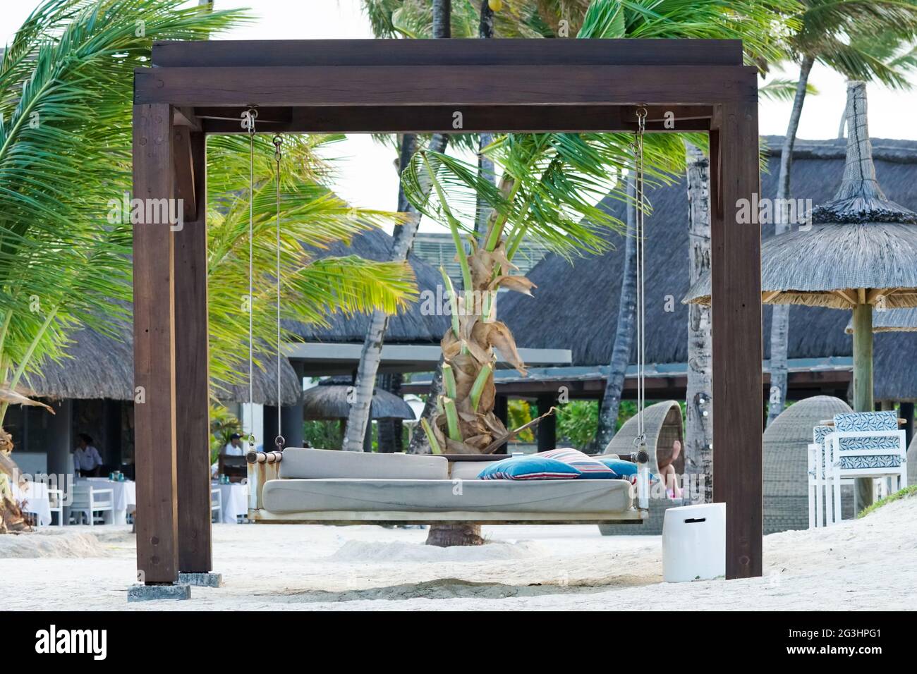 Swing bed or seat on a beach at a hotel resort in Mauritius concept ...