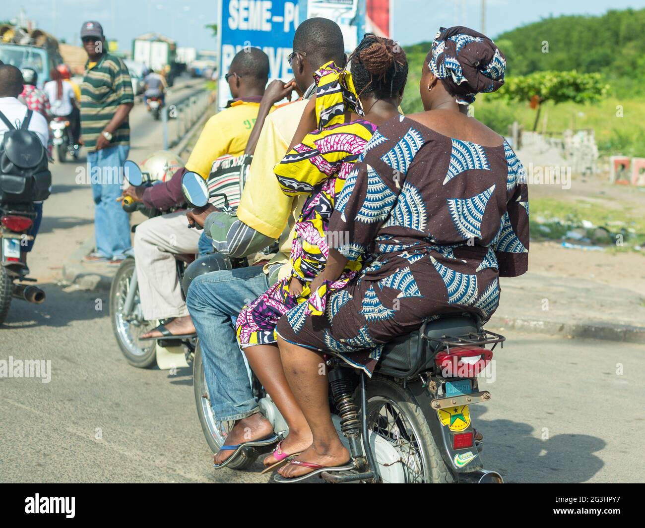 Motorcycle taxi in Benin Stock Photo - Alamy