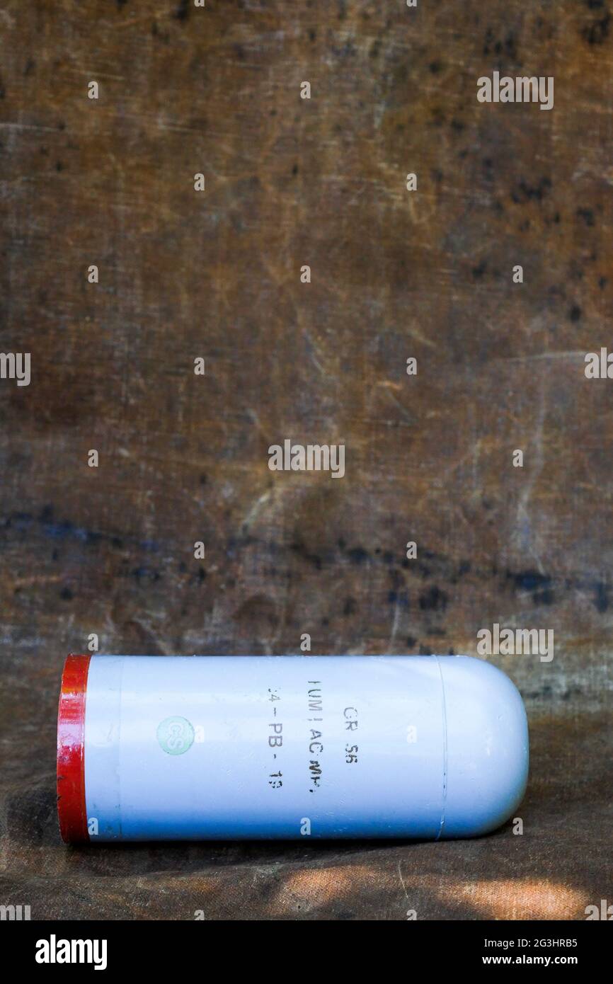 Tear-gas canister used by french riot police, France Stock Photo