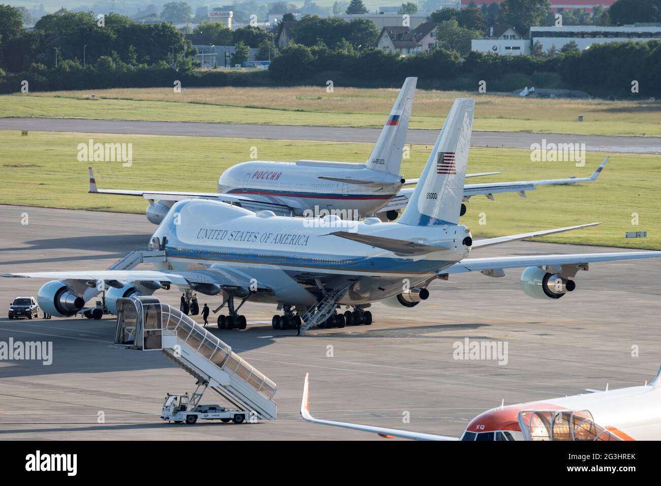 Air Force One, the Boeing-747 airplane of U.S. President Joe Biden, stands  by, as the Iljuschin Il-96, presumably carrying Russian President Vladimir  Putin, taxies to the runway after the US - Russia