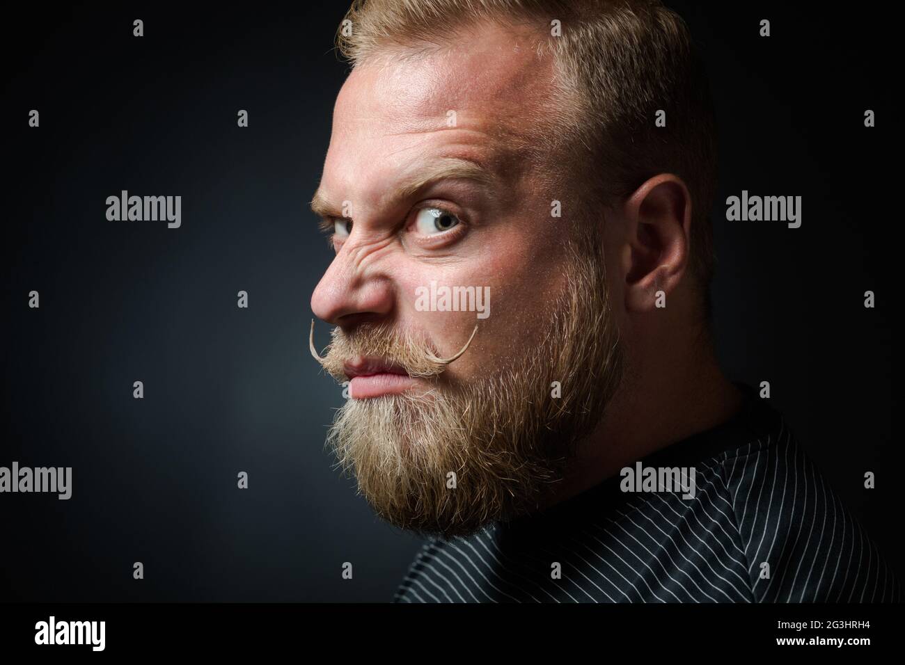 Demanding bearded man Stock Photo