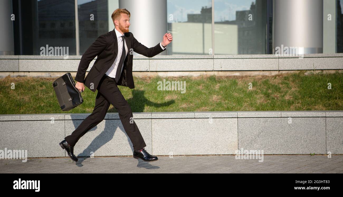 Businessman in hurry Stock Photo