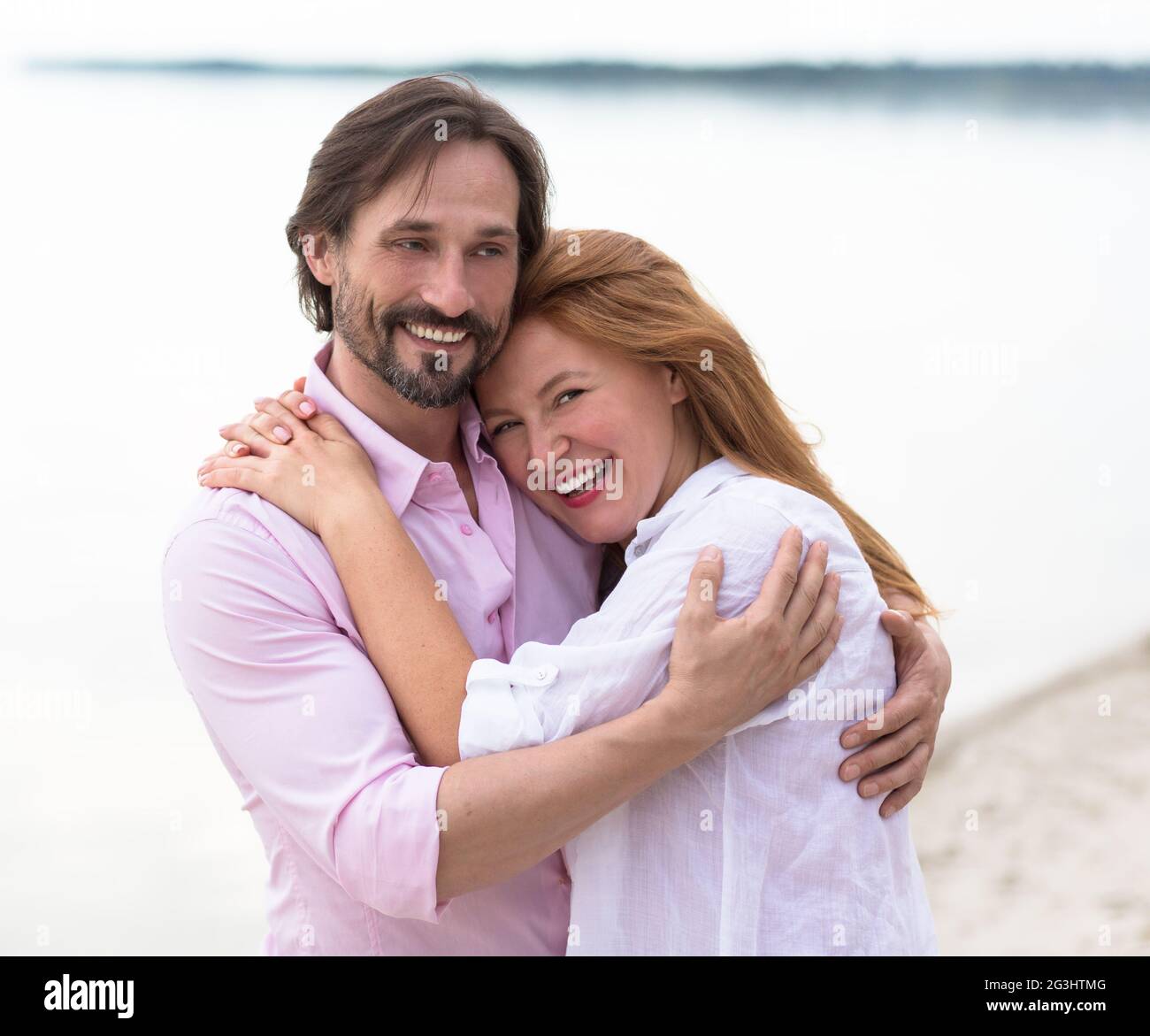 Smiling middle aged couple hi-res stock photography and images - Alamy