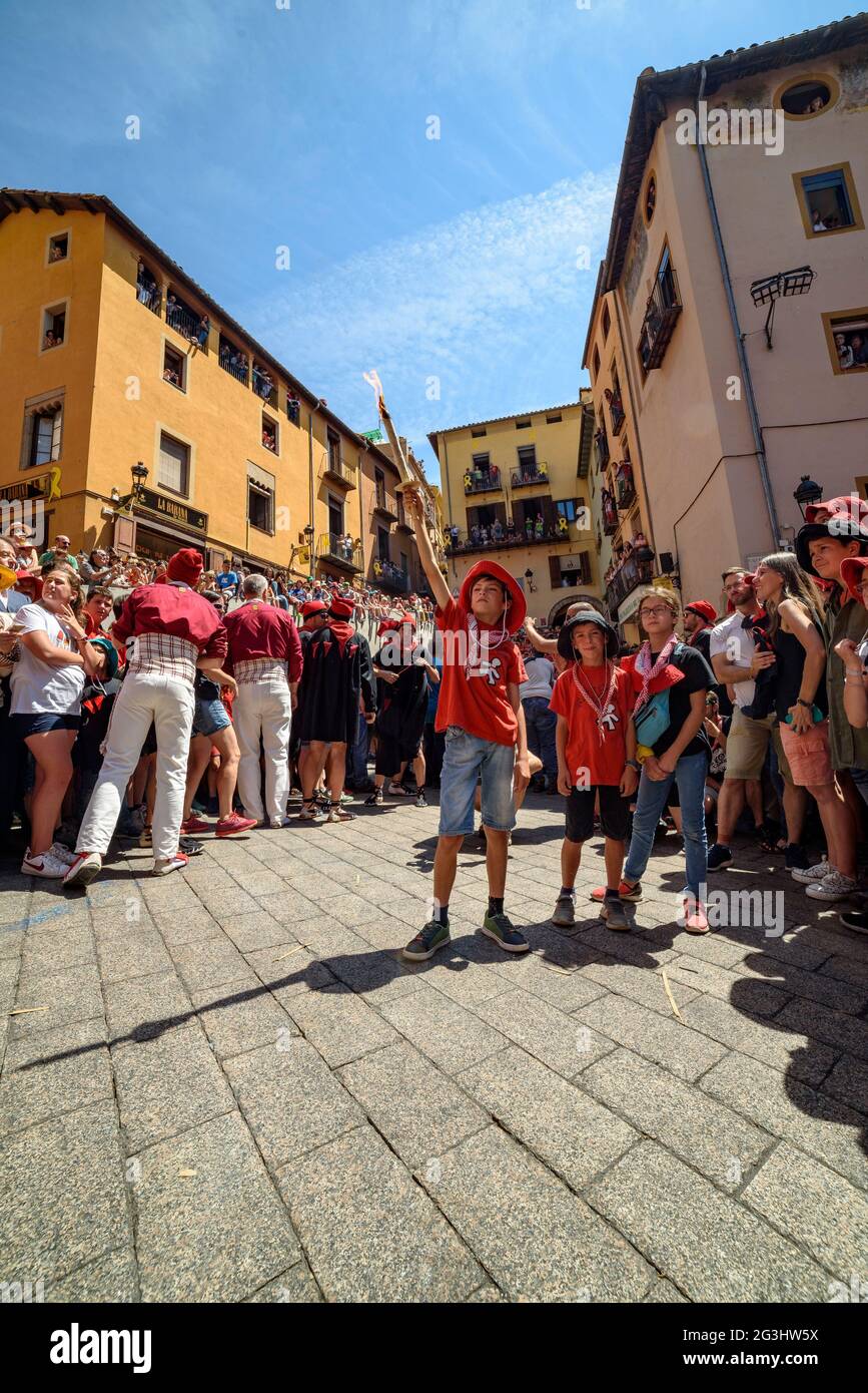 La Flama del Canigó (Catalan tradition for the summer solstice) arriving at the Sant Pere square during the celebration of the Patum de Berga festival Stock Photo