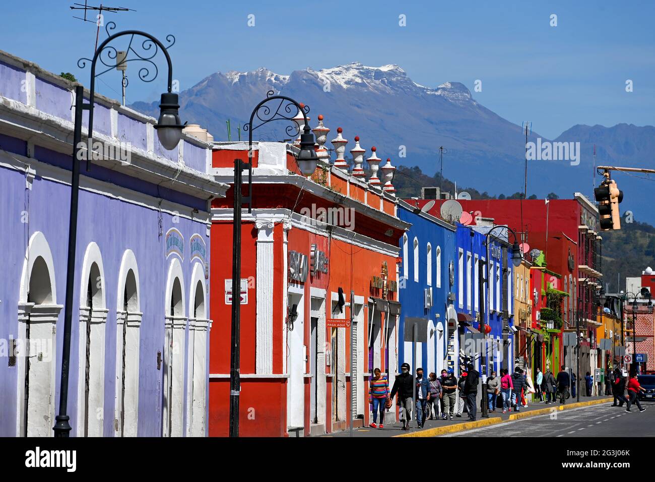 Cholula, Puebla, Mexico. Colourful Mexican houses on street  Copyright 2021 © Sam Bagnall Stock Photo