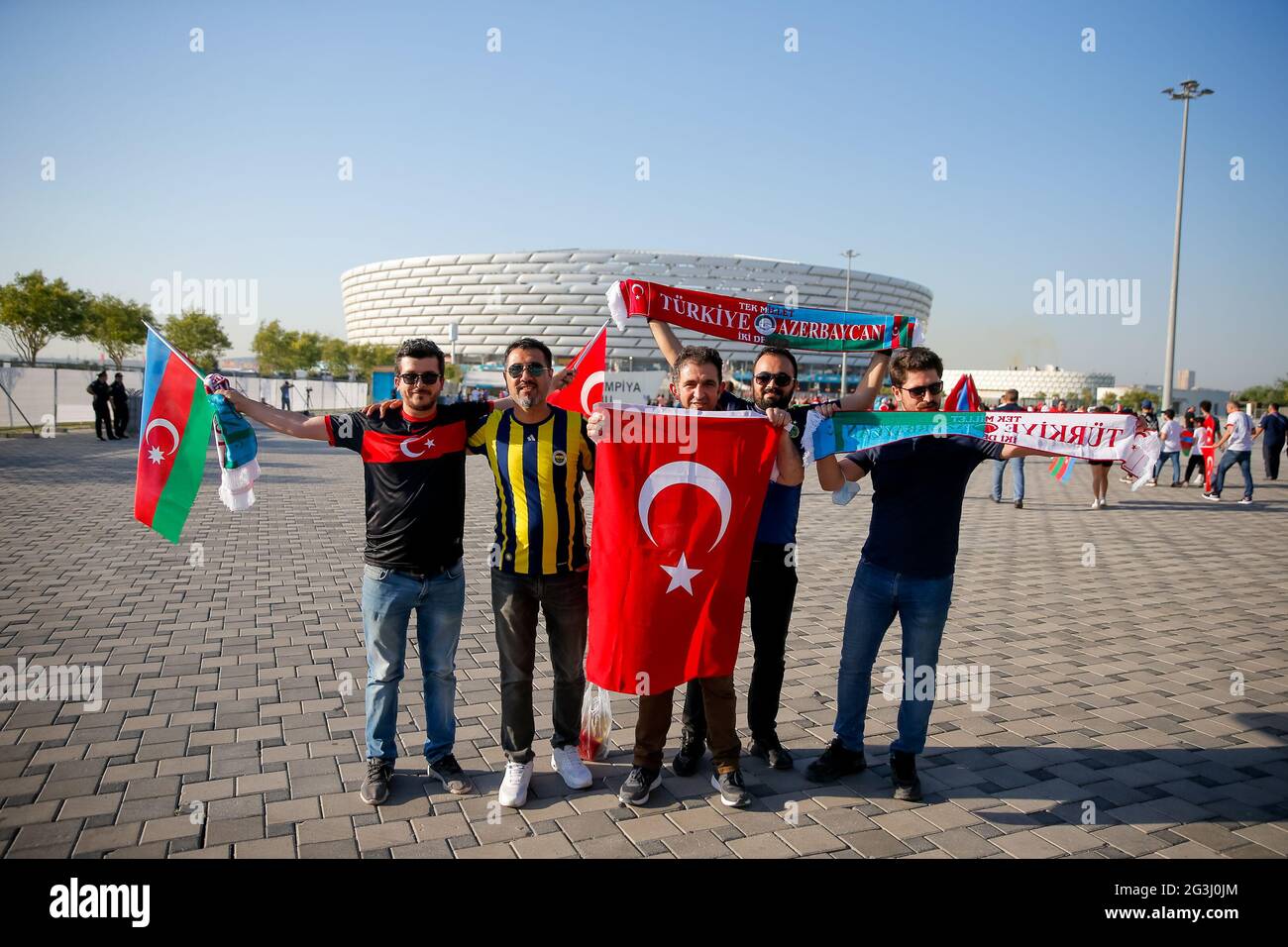 BAKU, AZERBAIJAN - JUNE 16: Turkish fans pose for a photo outside Baku Olympic Stadium during the UEFA Euro 2020 Championship Group A match between Turkey National Team and Wales National Team at Baku Olympic Stadium on June 16, 2021 in Baku, Azerbaijan (Photo by Orange Pictures) Stock Photo