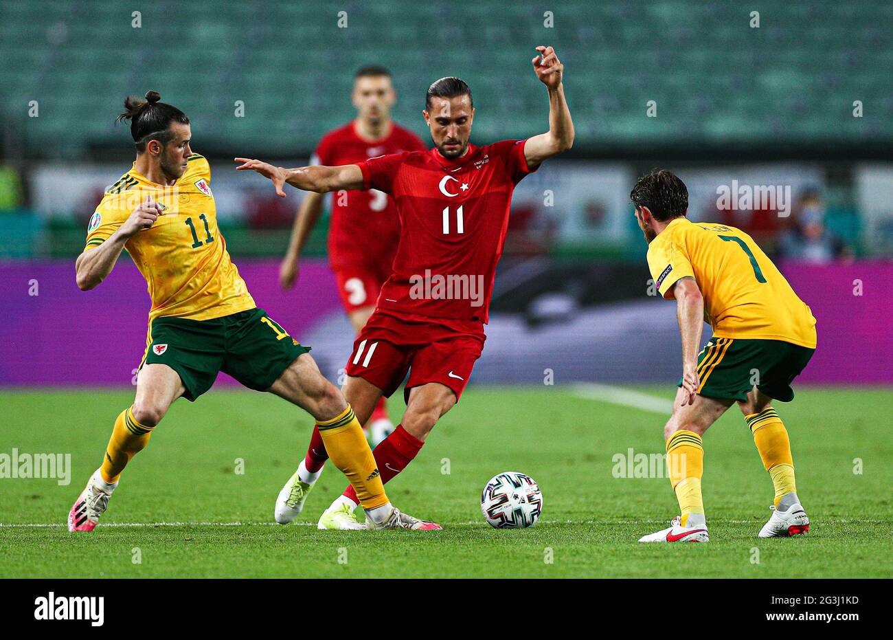 Yusuf Yazici of Turkey fighting for the ball with Gareth Bale of Wales during the UEFA Euro 2020 Group A match at the Baku Olympic Stadium in Azerbaijan. Picture date: Wednesday June 16, 2021. Stock Photo