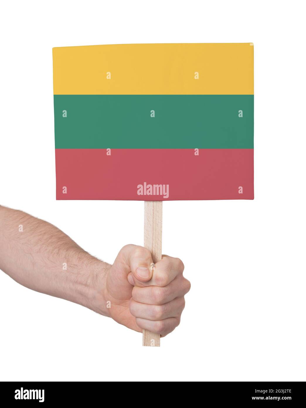 Hand holding small card - Flag of Lithuania Stock Photo