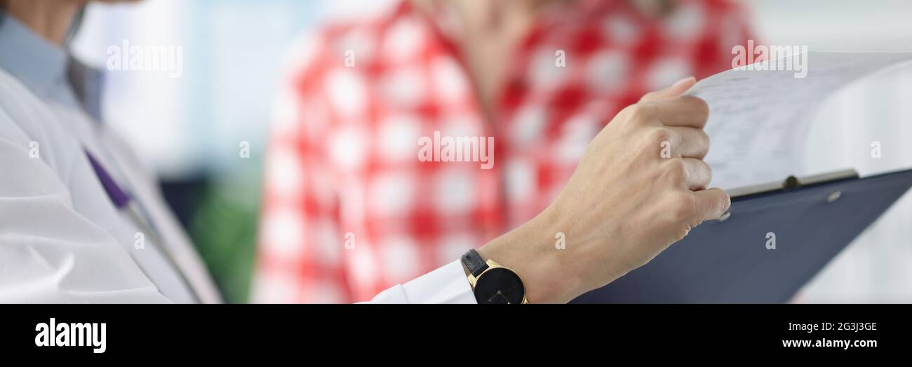 Doctor and patient study results of examination Stock Photo - Alamy