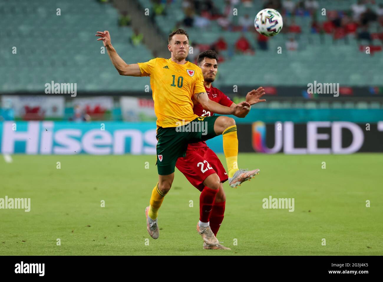 Aaron Ramsey of Wales and Kaan Ayhan of Turkey during the UEFA Euro 2020 Group A match at the Baku Olympic Stadium in Azerbaijan. Picture date: Wednesday June 16, 2021. Stock Photo