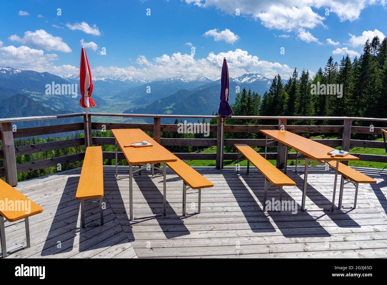 alm hut hutte terrasse with benches in tyrol with mountain view Stock Photo