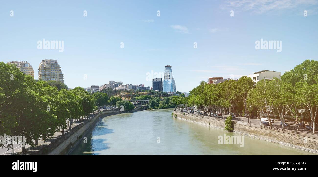 Tbilisi city landmark on bright sunny day on river Kura Stock Photo
