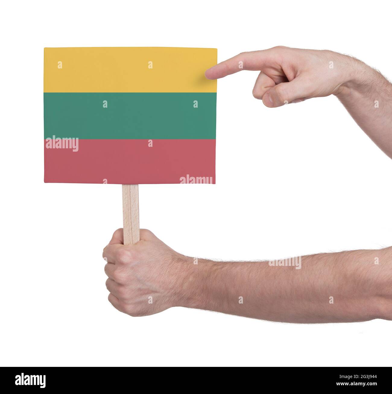 Hand holding small card - Flag of Lithuania Stock Photo