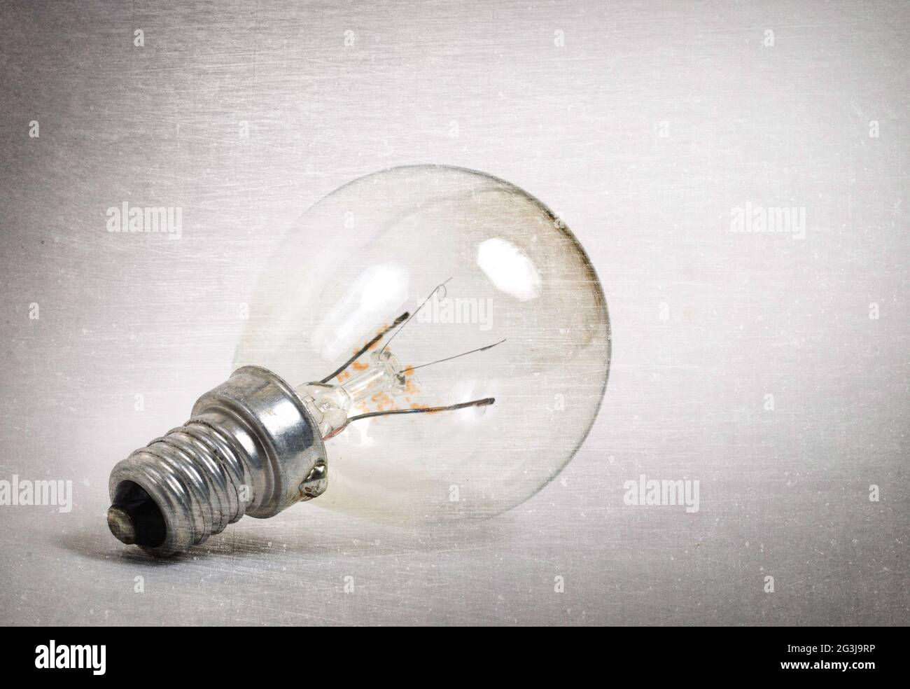 Old lightbulb isolated on a white background Stock Photo - Alamy