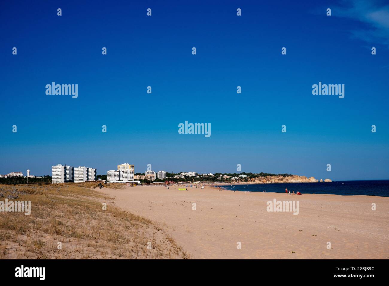 An almost deserted beach in Alvor, The Algarve, Portugal in June 2021 after Portugal was moved to the amber list for international travel by the UK go Stock Photo