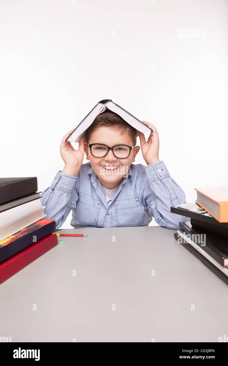 Little business boy hiding Stock Photo - Alamy