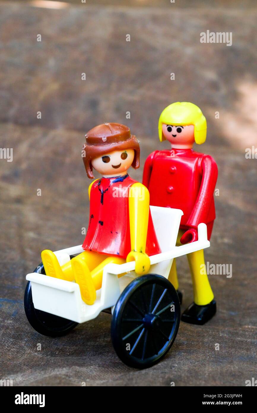 Disabled person and helper, illustration for health issue, France Stock Photo Alamy