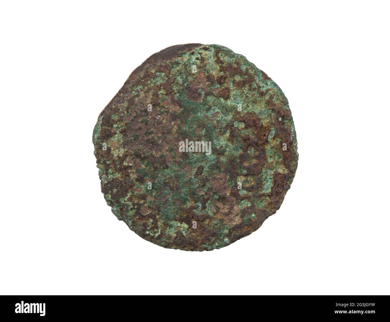 Unrecognisable old coin, rusted and green, isolated Stock Photo