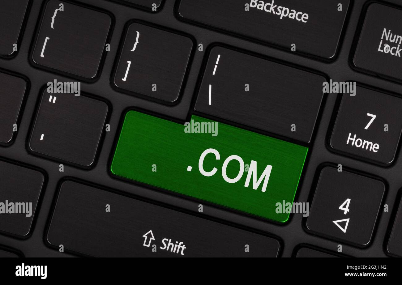 Computer key green - .com Stock Photo - Alamy