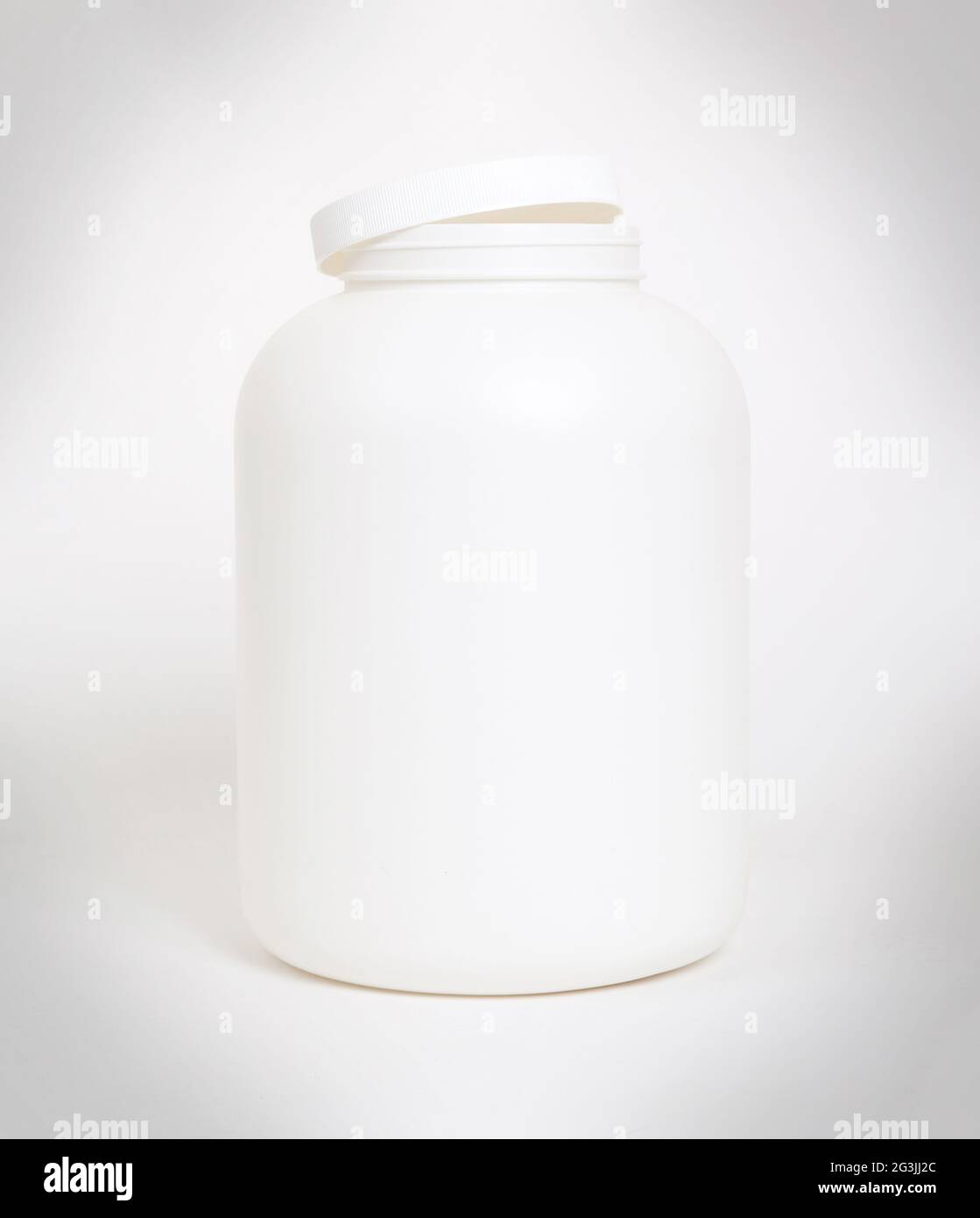 Empty protein powder container Stock Photo by ©michaklootwijk