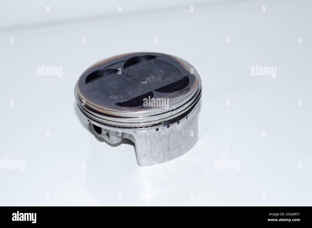 High angle view of a damaged piston ring in the light background