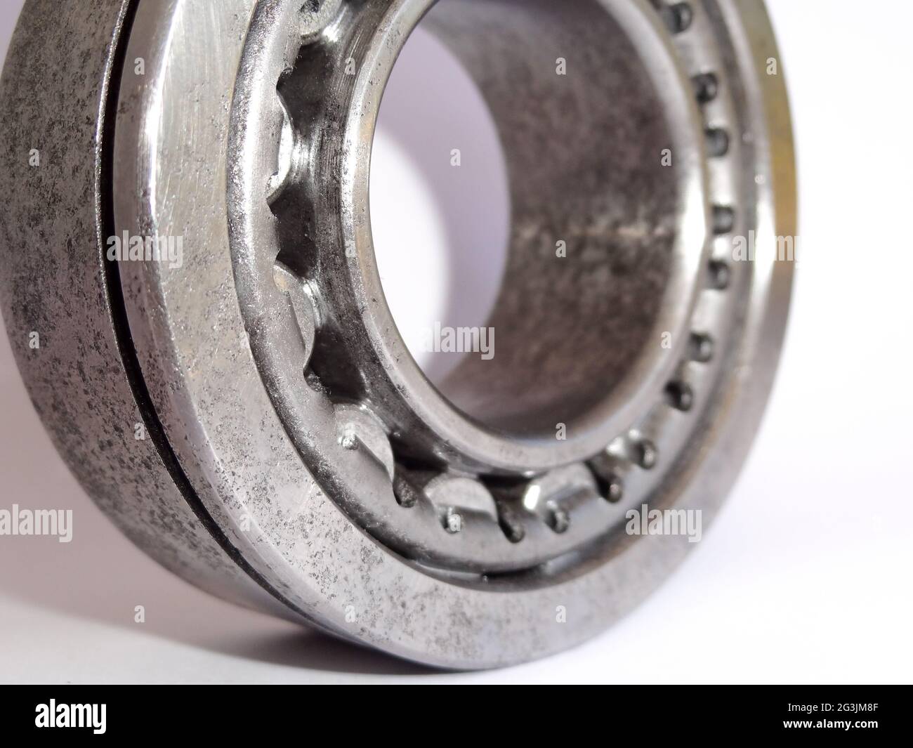 Rough metal surface of a bearing ball after cleaning with electrolysis