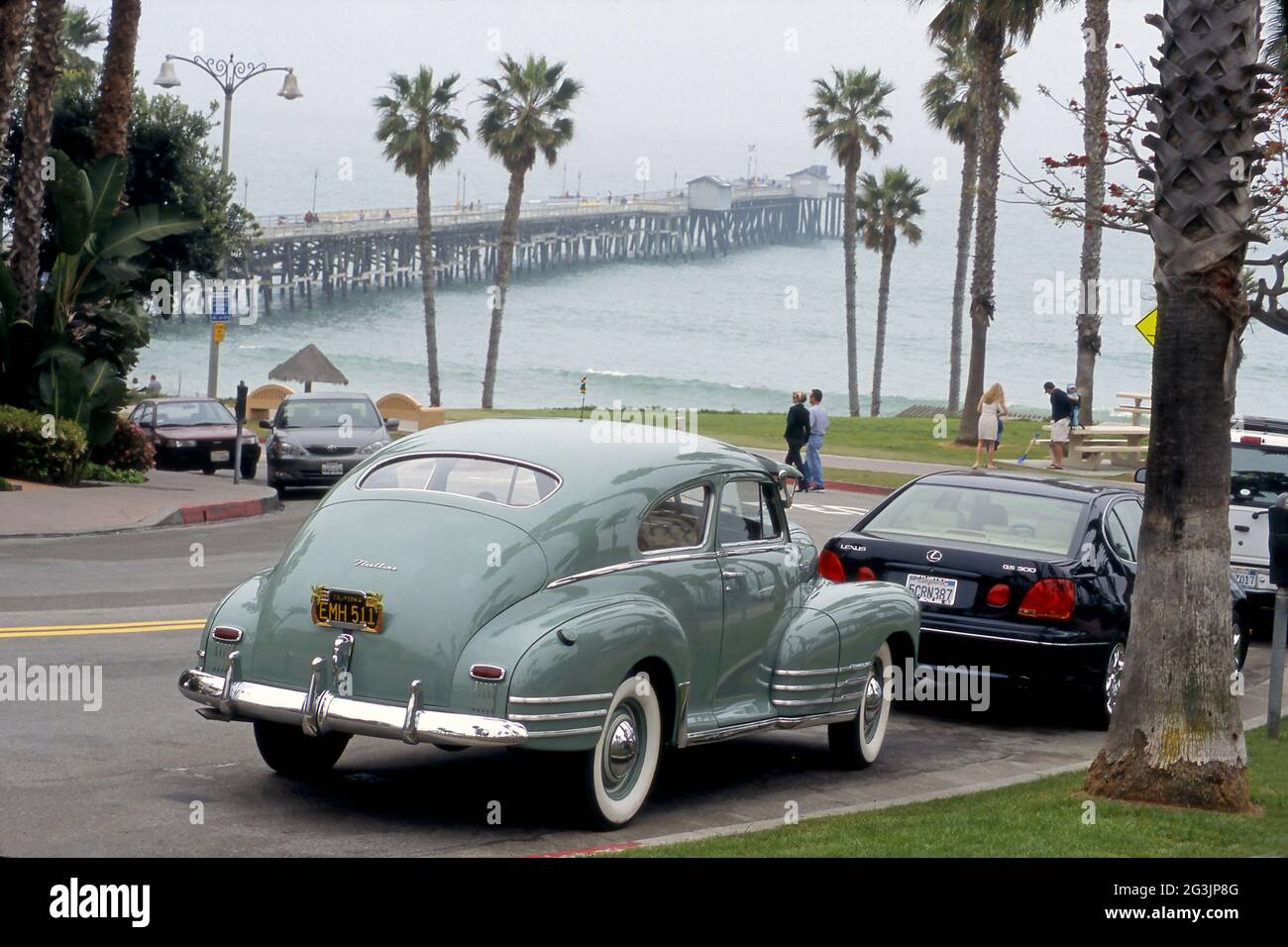 A classic 1940s Chevrolet Fleetline  car parked near the san Clemente Pier in Orange County, CA Stock Photo