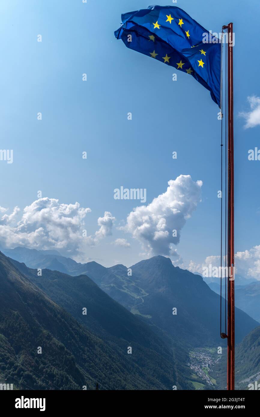 Waving European Union EU flag on the blue sky background Stock Photo
