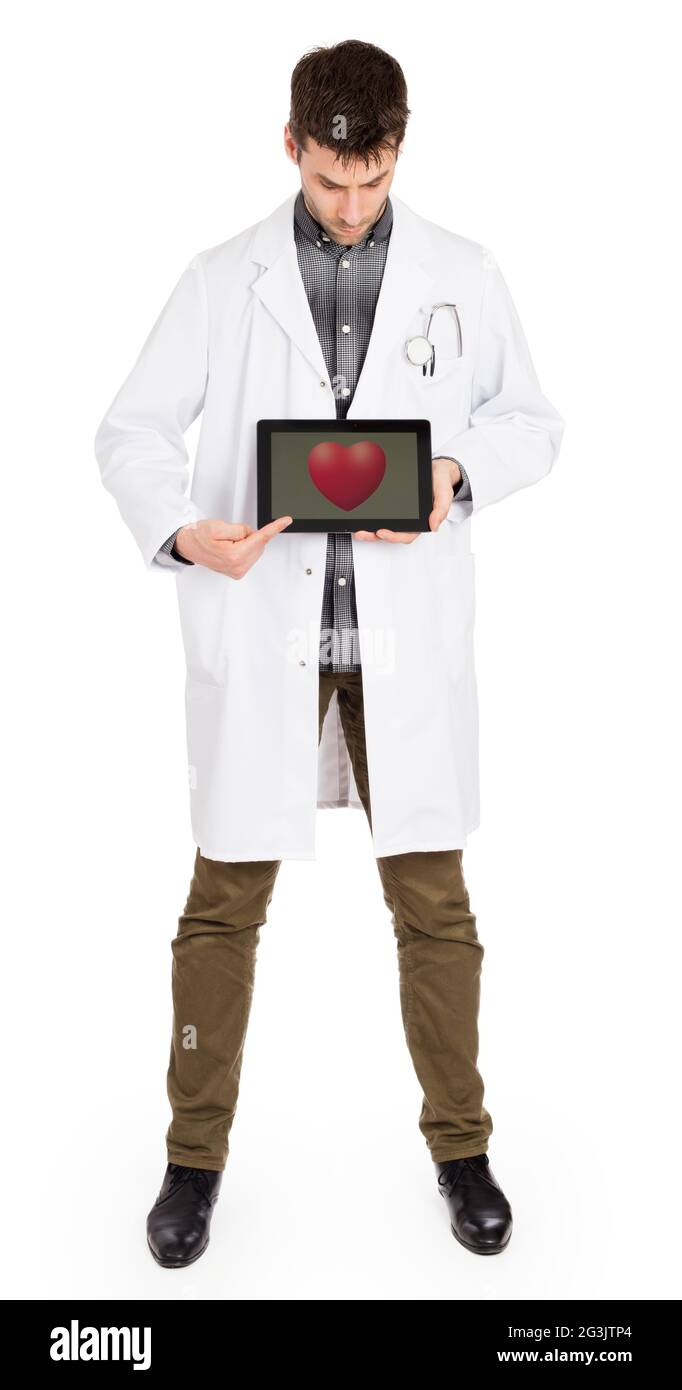 Doctor holding tablet - Red heart Stock Photo - Alamy