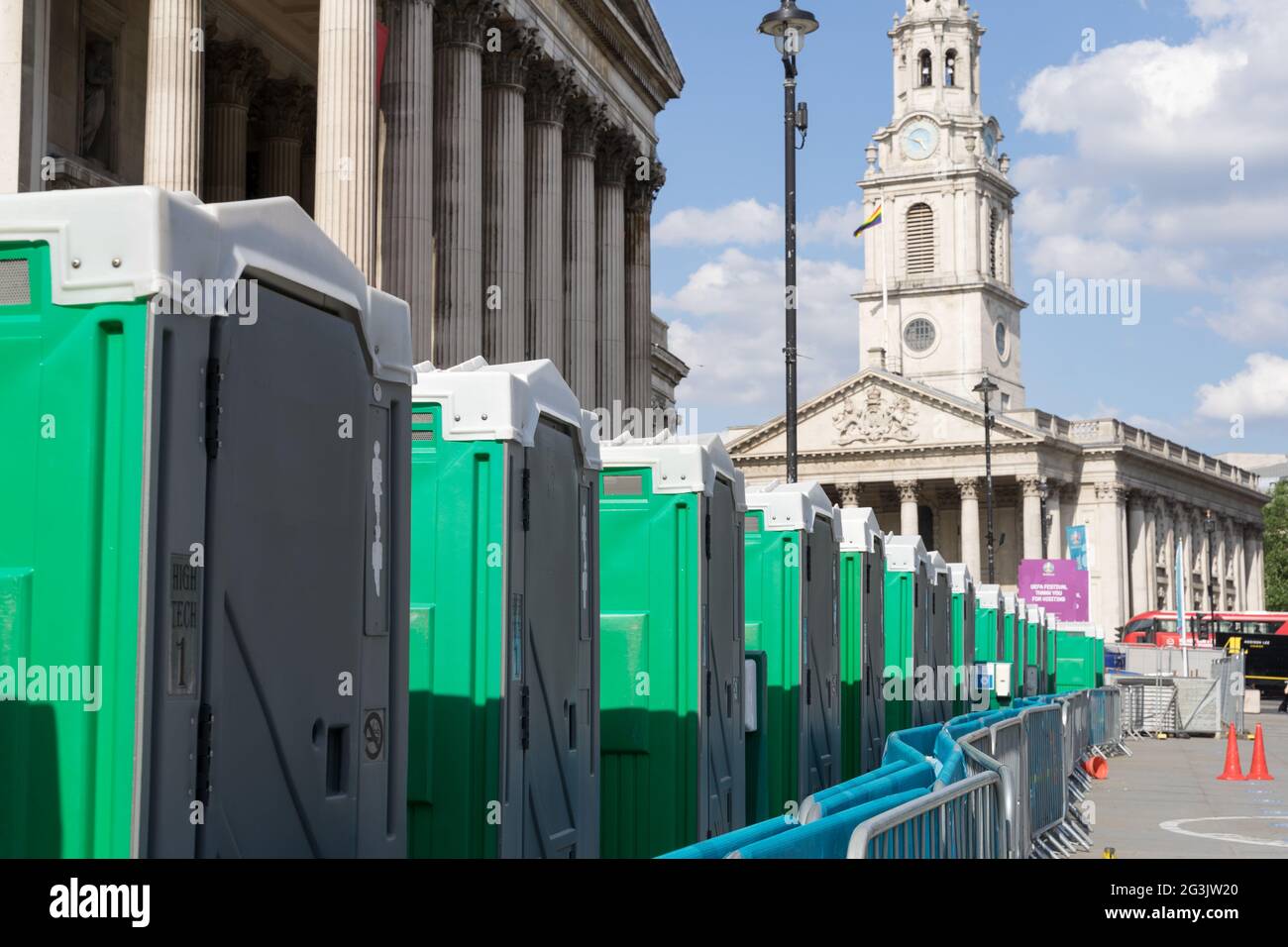 rows of Portable toilets installed in front of national gallery, EURO'020, UEFA football festival Trafalgar square, London, England Stock Photo
