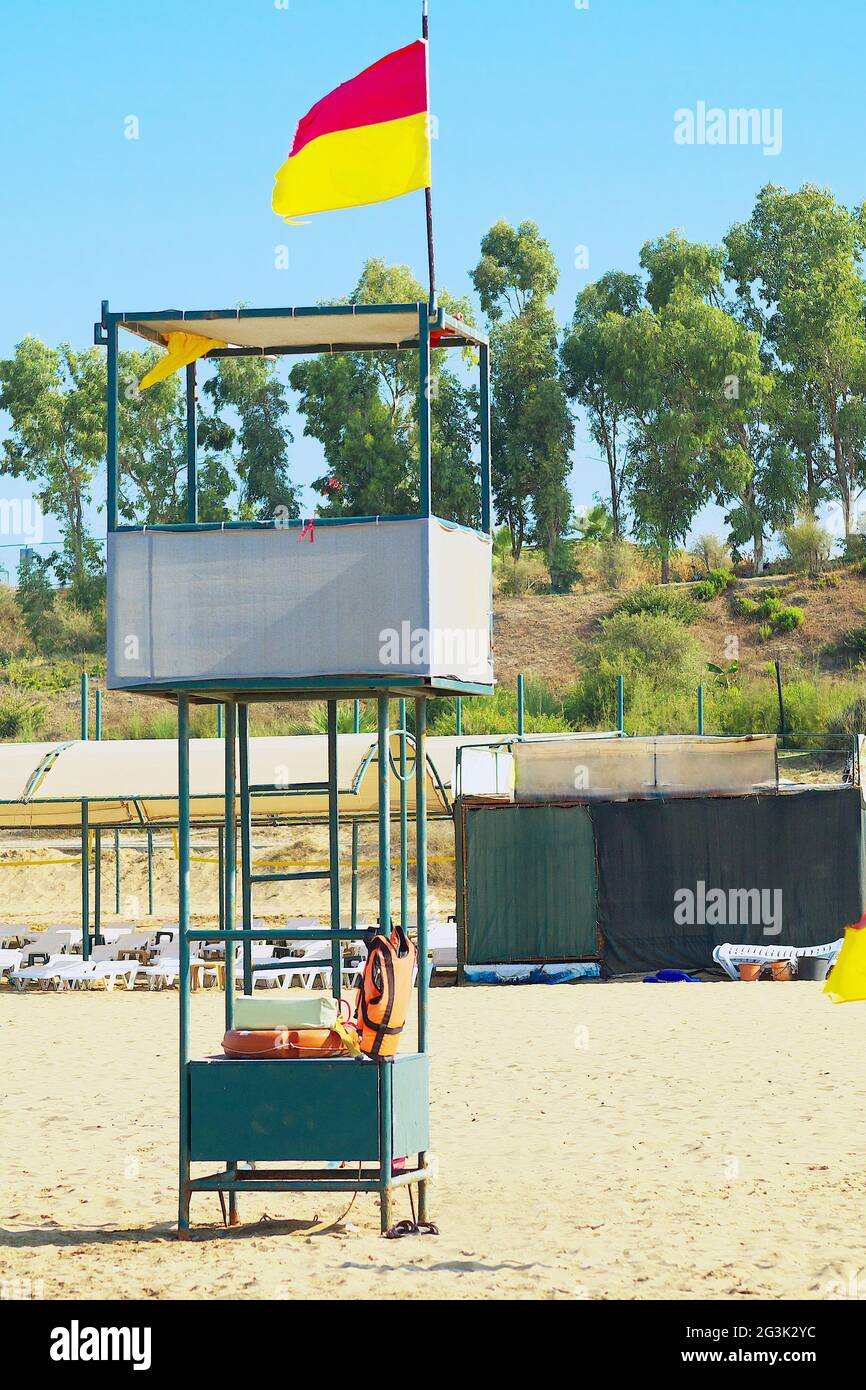 Lifeguard Building lifeguard tower and beach infrastructure in background, toned Stock ...