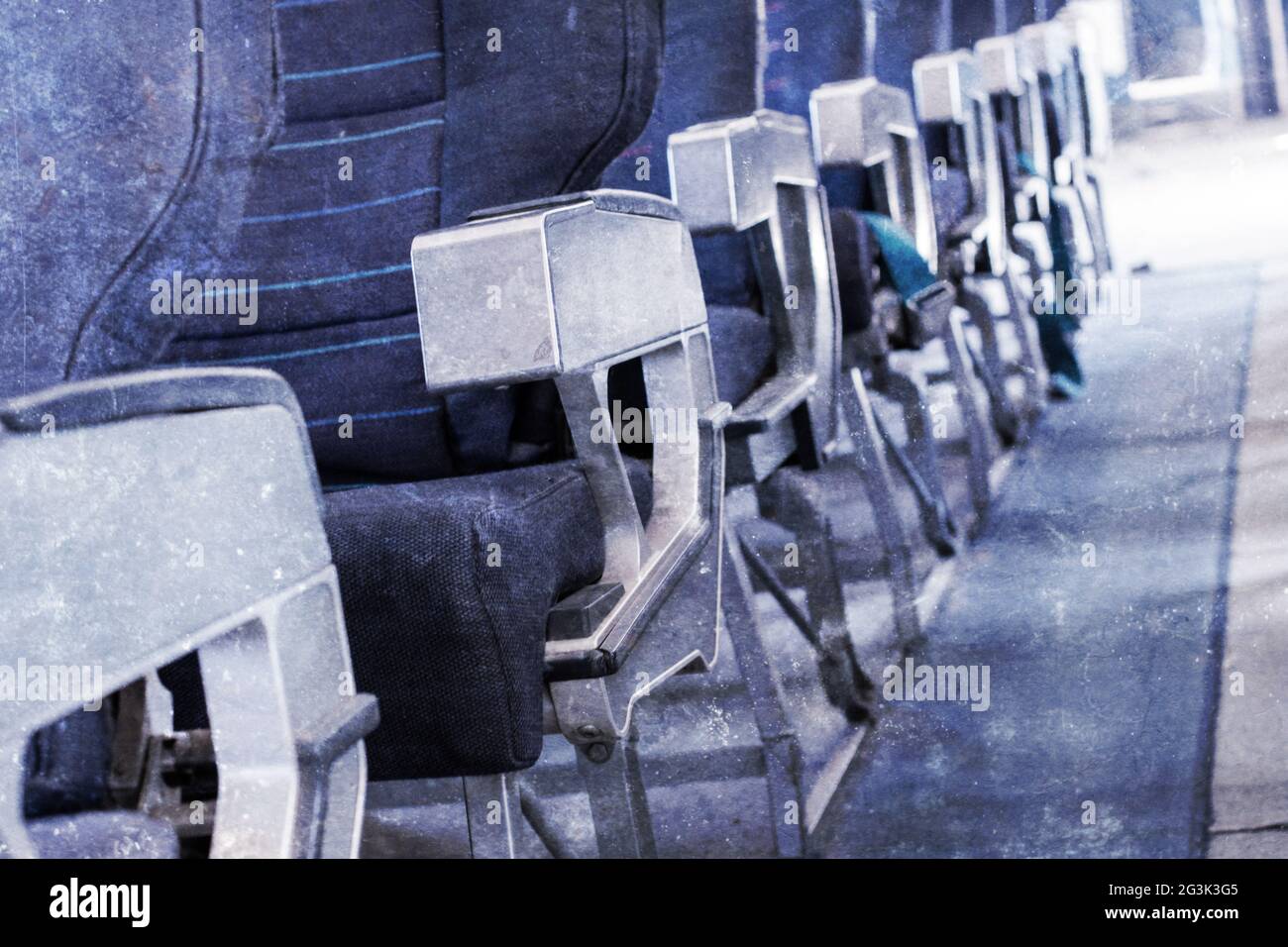 Empty old airplane seats in the cabin, selective focus, vintage effect