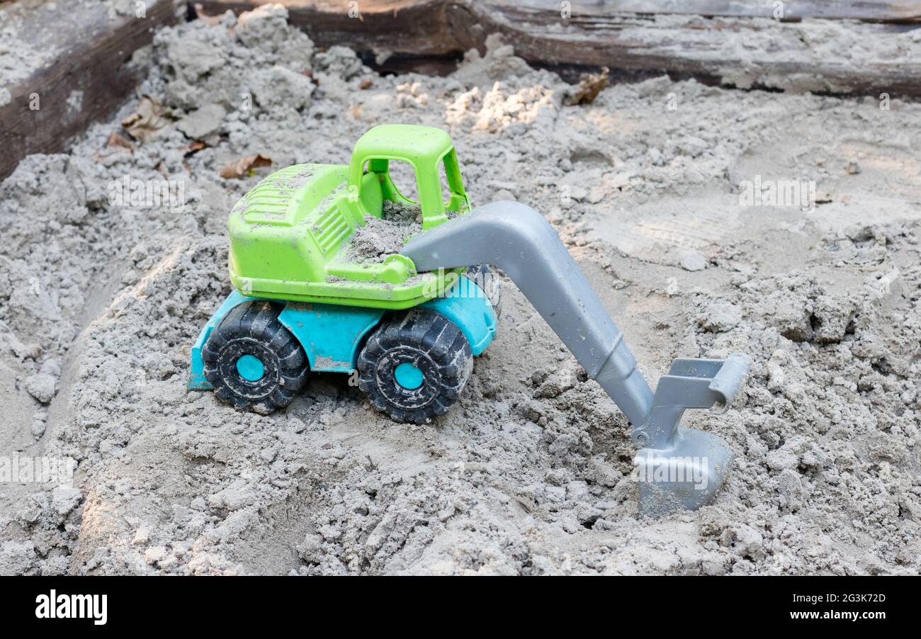 Toy trucks on sand Stock Photo Alamy