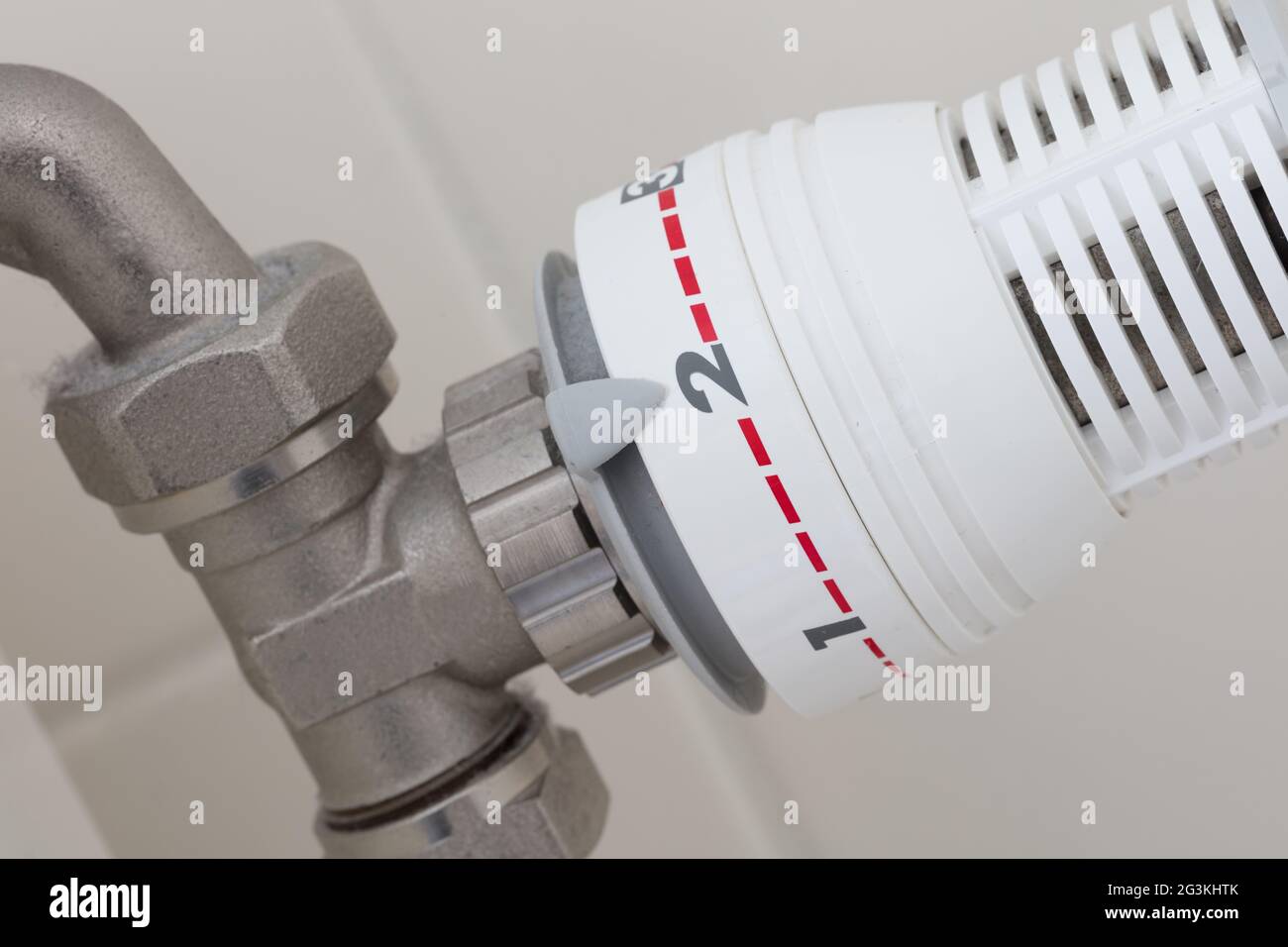 Temperature knob of heating radiator, used and dusty Stock Photo - Alamy