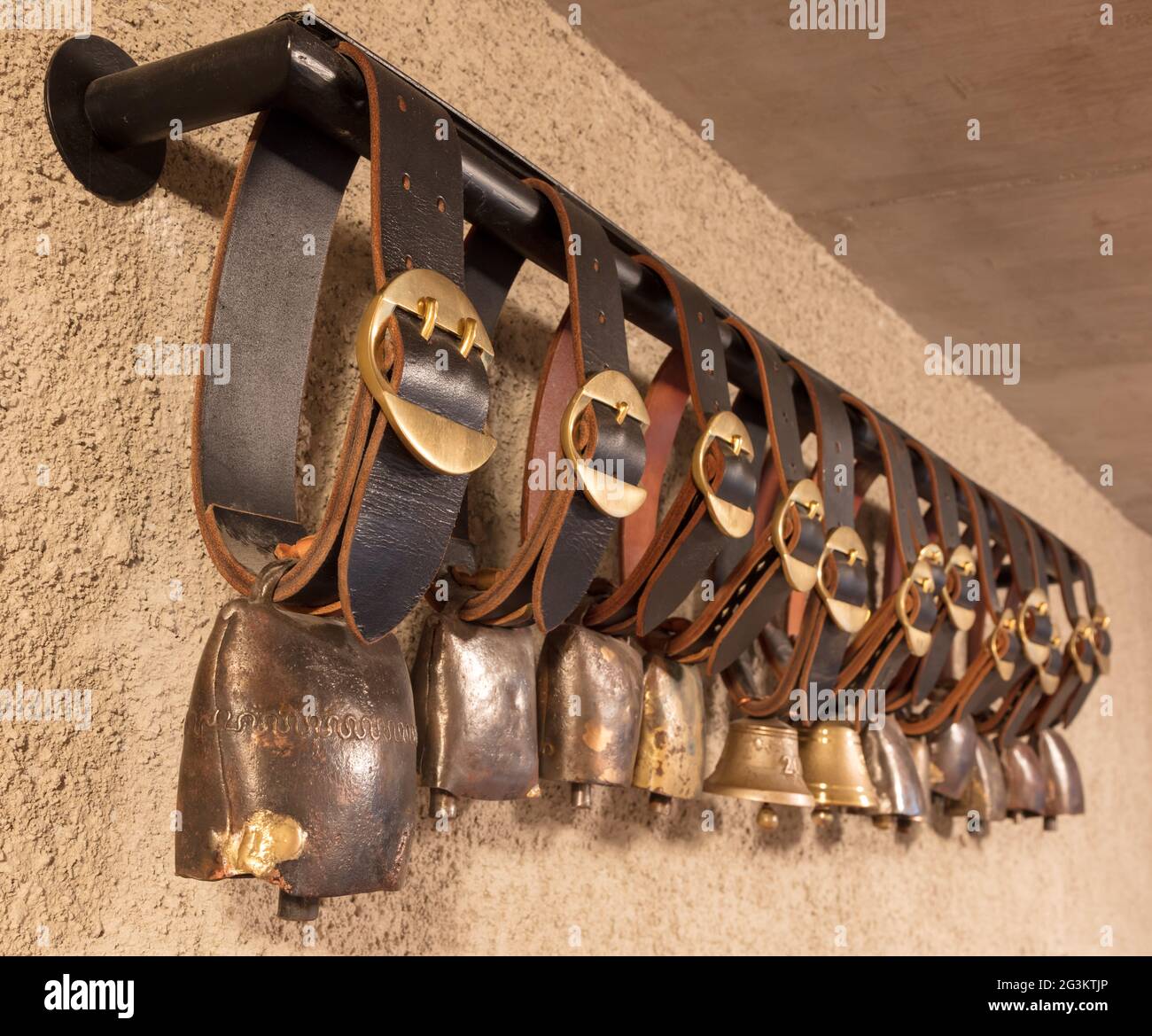 Swiss cowbells hanging at an farm in the Alps Stock Photo Alamy