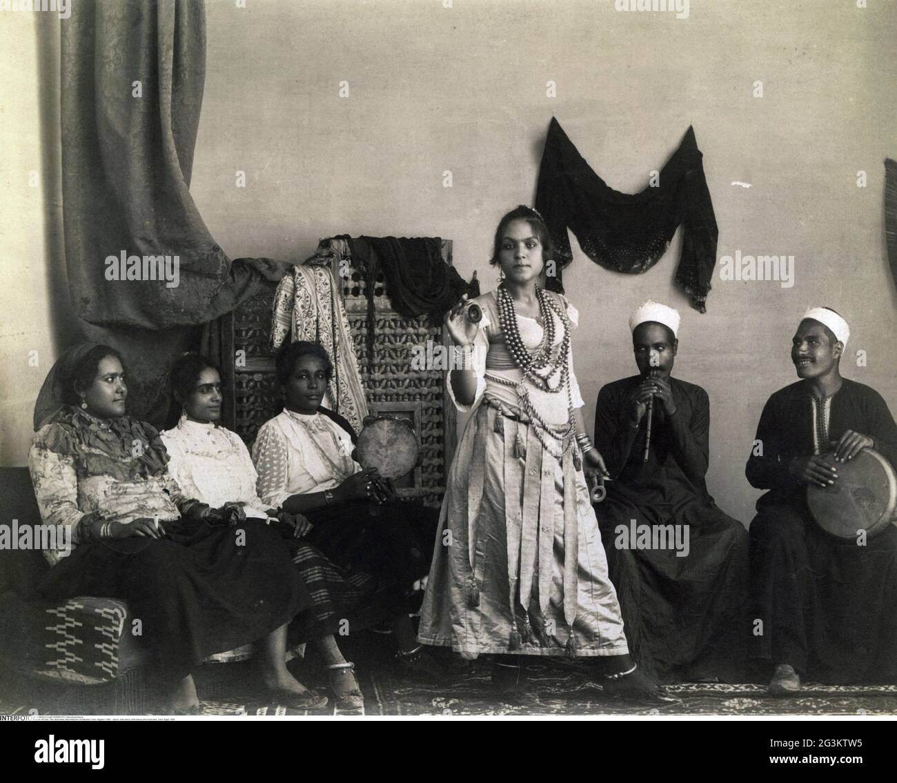 dance, belly dance, belly dancer and musicians, Cairo, Egypt, 1898, ADDITIONAL-RIGHTS-CLEARANCE-INFO-NOT-AVAILABLE Stock Photo