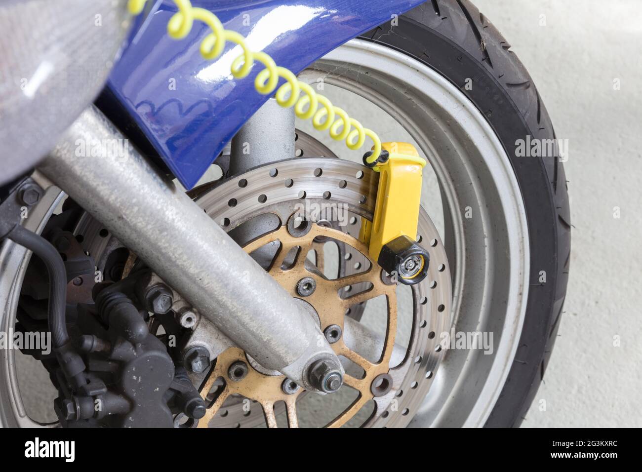 Security lock blocking the motorcycle wheel Stock Photo Alamy