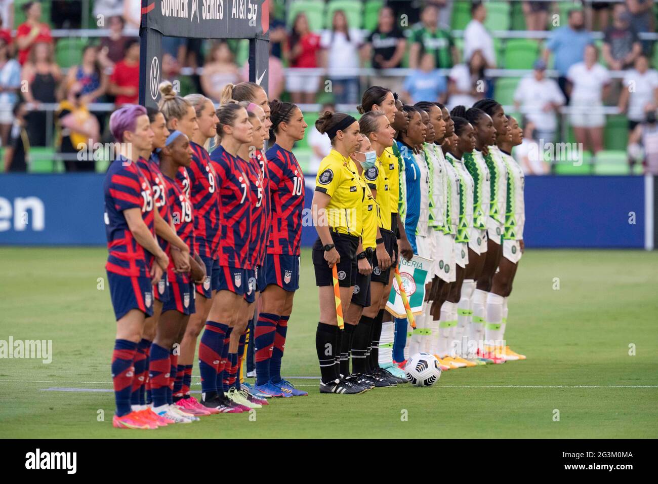 Austin, Texas, USA, June 16 2021: The USA and Nigerian teams line up for introductions before the US Women's National Team (USWNT) beats Nigeria, 2-0 in the inaugural match of Austin's new Q2 Stadium. The U.S. women's team, an Olympic favorite, is wrapping up a series of summer matches to prep for the Tokyo Games. Credit: Bob Daemmrich/Alamy Live News Stock Photo