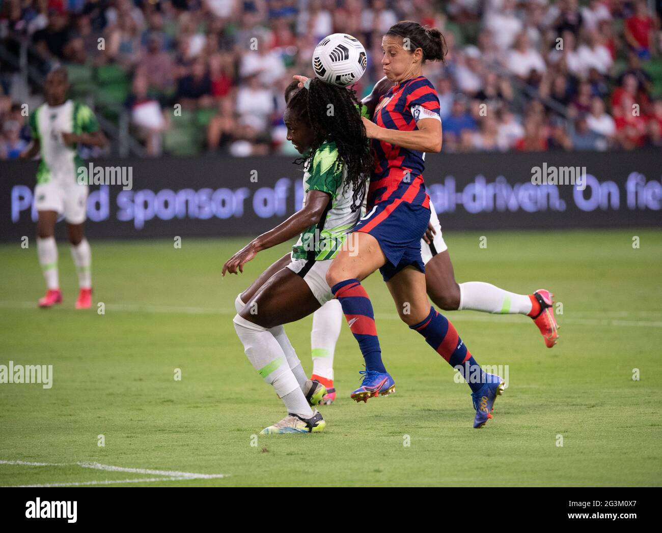 Austin, Texas, USA, June 16 2021: USA forward CARLI LLOYD (10) takes on Nigeria's MICHELLE ALOZI (22) during the second half of the US Women's National Team (USWNT) 2-0 victory over Nigeria, in the first match at Austin's Q2 Stadium. The U.S. women's team, an Olympic favorite, is wrapping up a series of summer matches to prep for the Tokyo Games. Press scored a goal in the win for USA Soccer. Credit: Bob Daemmrich/Alamy Live News Stock Photo
