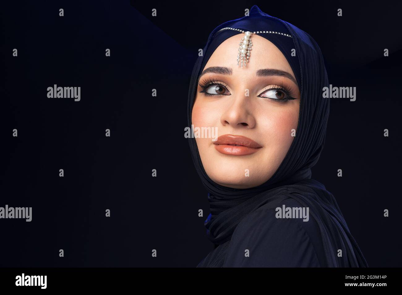 Close up portrait of beautiful muslim girl dressed in hijab Stock Photo ...