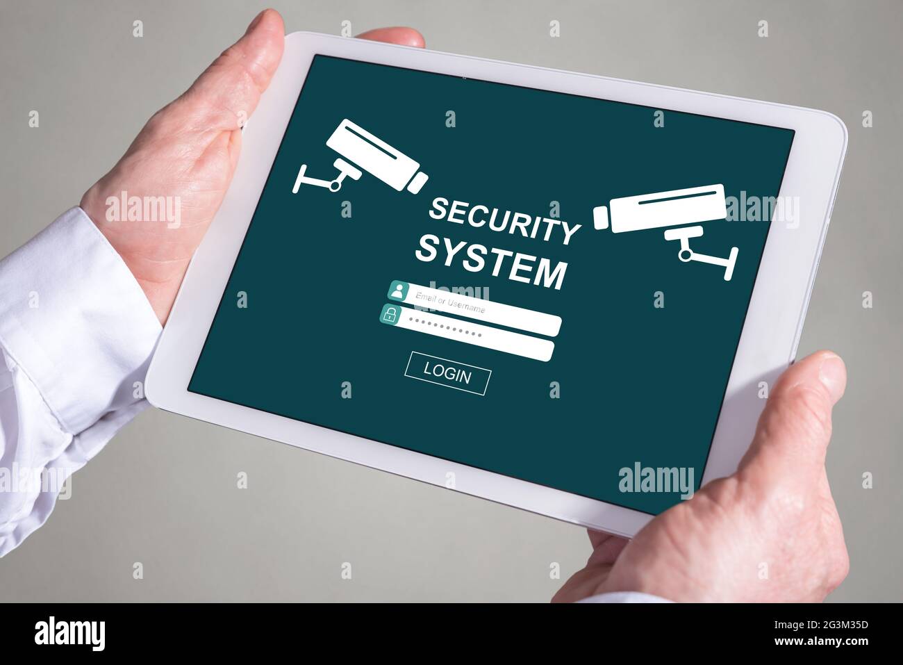Tablet screen displaying a security system concept Stock Photo - Alamy