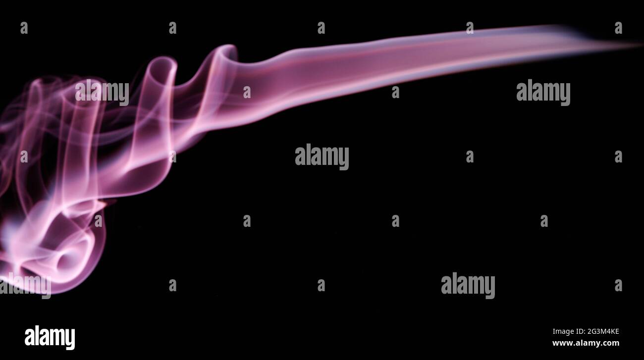 Pink smoke line shane flow on black isolated background Stock Photo