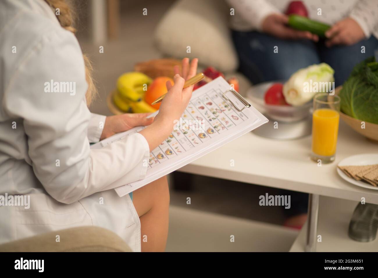 Nutritionist hard work with patient Stock Photo